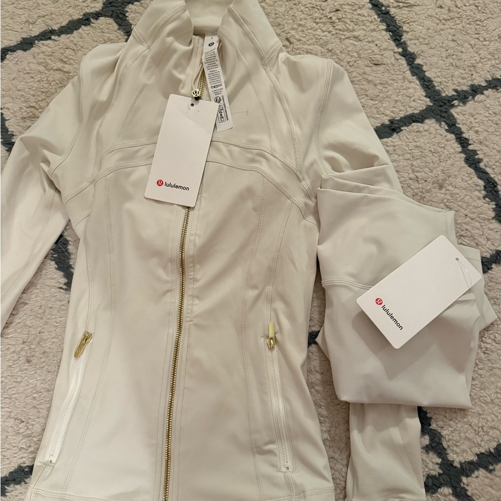 lululemon cream and gold set shorts and zip up